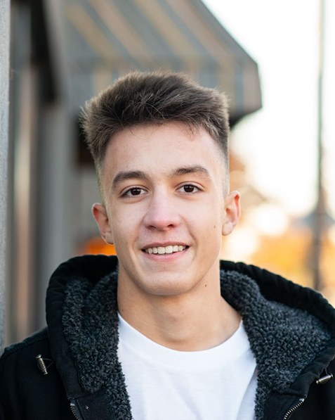 Isaiah Schell, founder and craftsman behind Symphony Ears